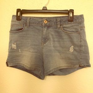 Mid rise light washed jean shorts